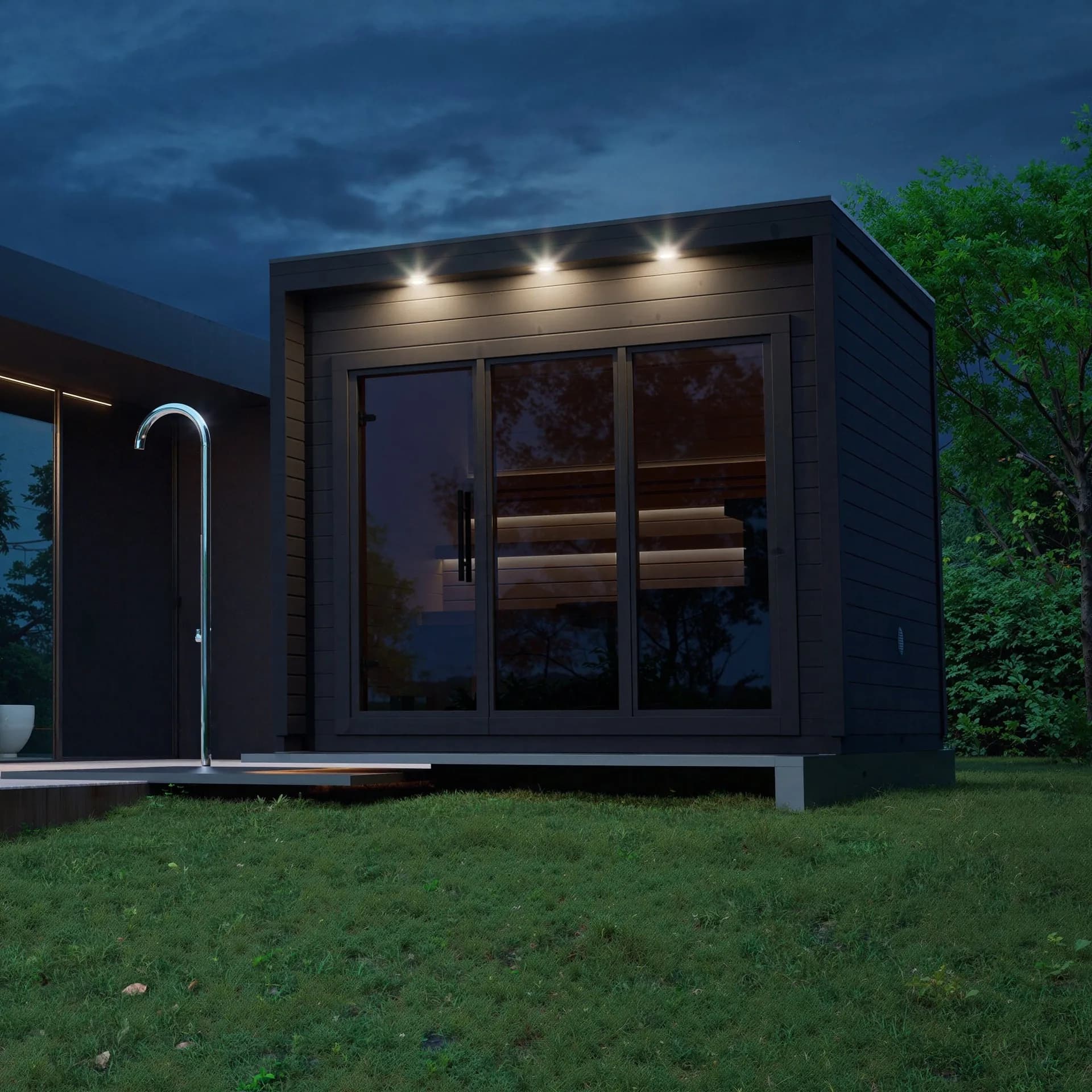 Loyly outdoor sauna cabin with glass doors in evening light