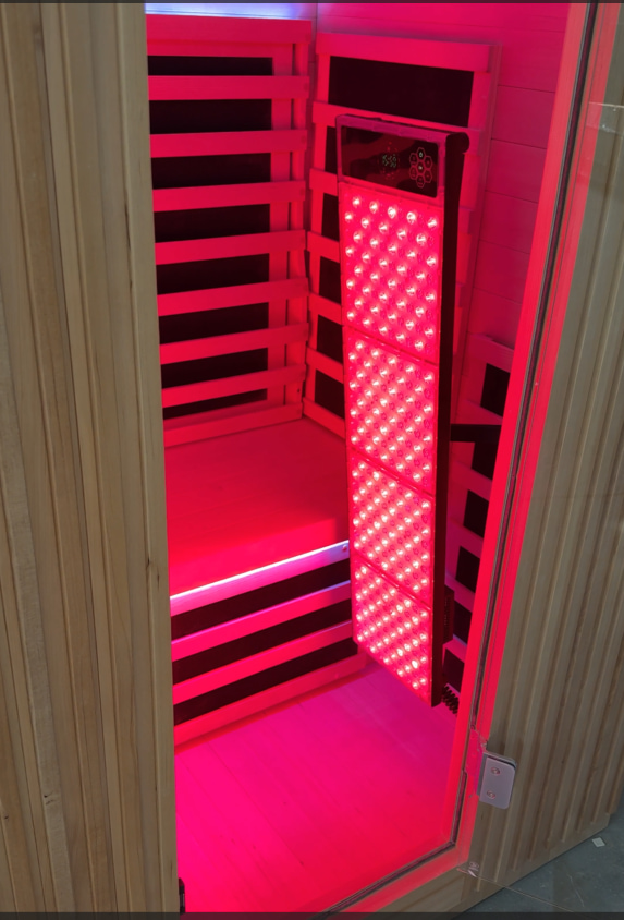 An Aurora Pro 2 red-light panel positioned beside the cabin bench